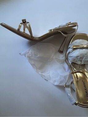 Gold Strappy Stiletto Sandals with Bow Accent